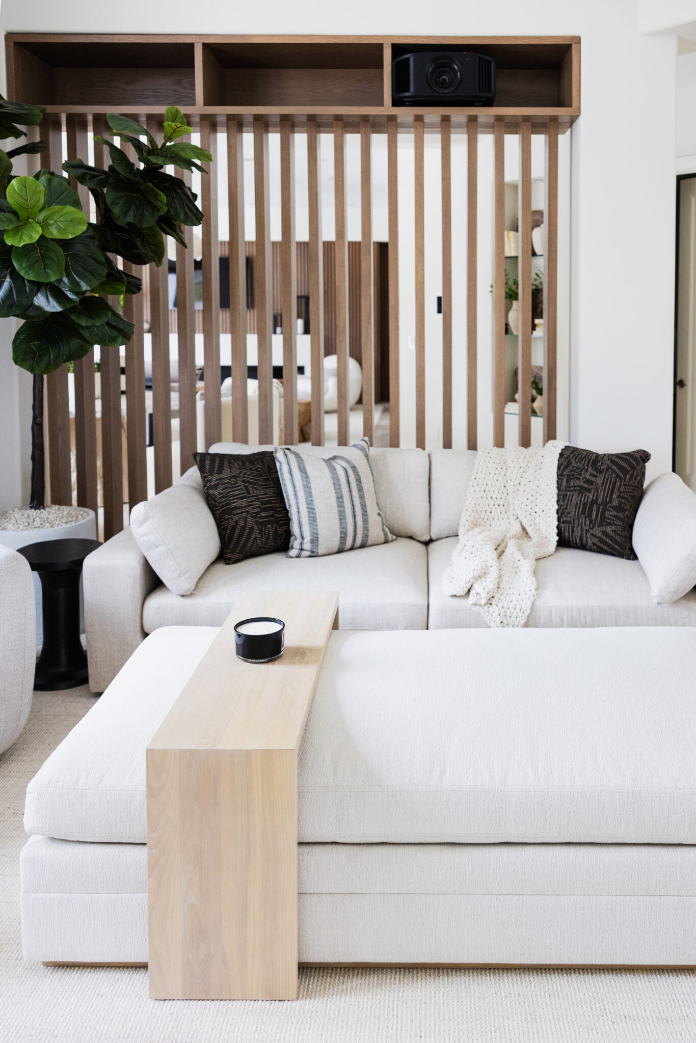 Living room with wood paneling wall.